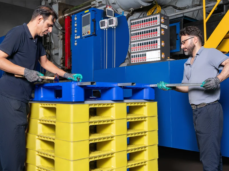 workers building pallet at persian sanat company